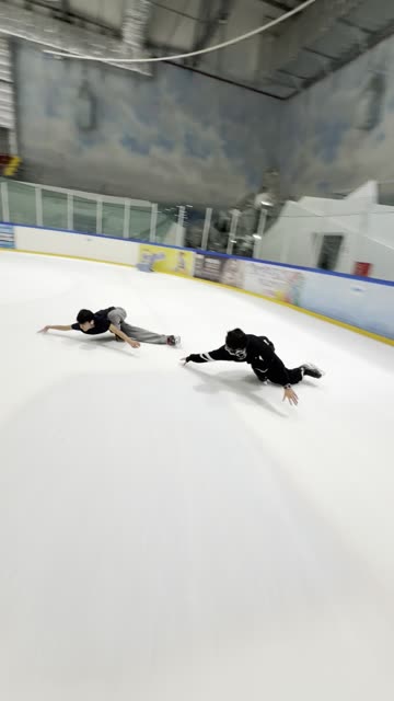 Ice Skating Show-Offs Knock Over Learner