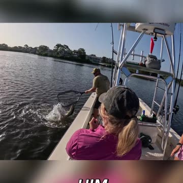 Epic Fishing Catch! Watch This Fish Leap Out of Water!