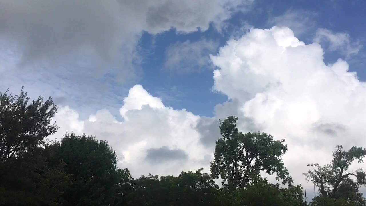 The sky is not always has white clouds, sometimes it is also covered with dark clouds.