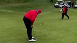 President Donald Trump walks away like a BOSS after hitting his putt