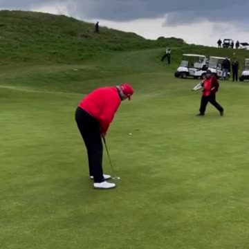 President Donald Trump walks away like a BOSS after hitting his putt