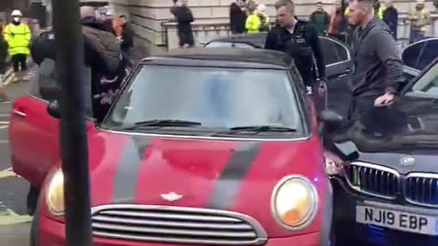 A Mini Cooper on the run tries to evade police capture with quick thinking.