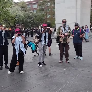 "STOP BOMBING CHILDREN"