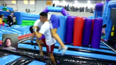 Reacting To WWE Moves At The Inflatable Park