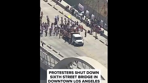 Wild anti-ICE agitators block the sixth Street bridge in downtown Los Angeles,