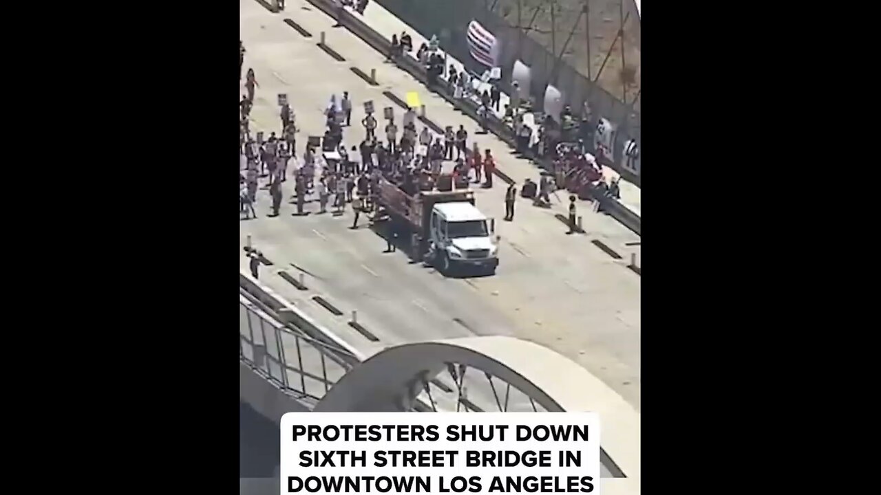 Wild anti-ICE agitators block the sixth Street bridge in downtown Los Angeles,