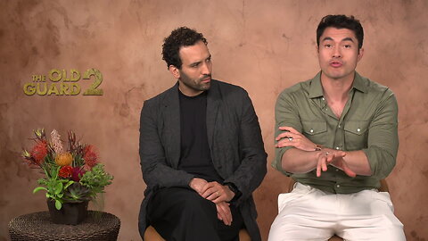 Henry Golding And Marwan Kenzari Talk 'The Old Guard 3' Hopes And That Romantic Joe/Nicky Scene