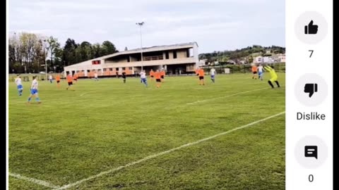 What a goal by the boy in white shirt