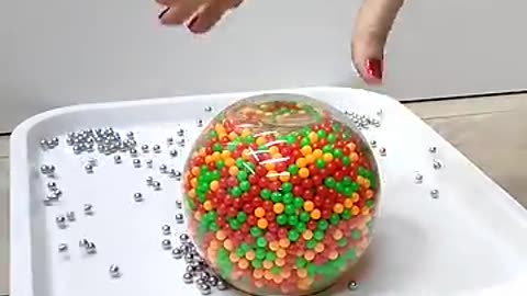 Viral: Tower of Plastic and Steel Beads Oddly Satisfying (Reverse)