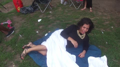 Luodong Massages Mature Mexican Woman With A Blanket Covering At The Park