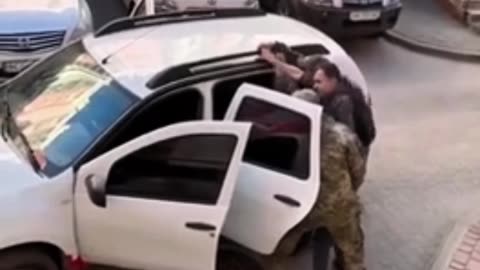 Ukrainian Man Resists Forced Conscription as Wife Records Everything