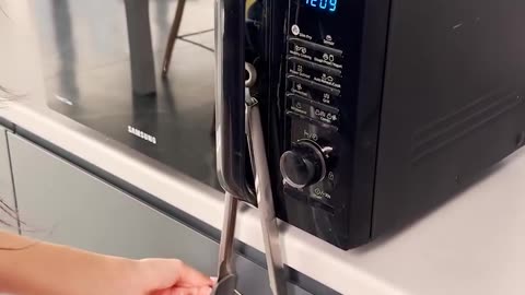 Keep your microwave's door shut with this hack.hd