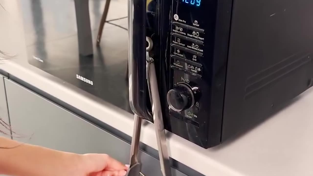 Keep your microwave's door shut with this hack.hd