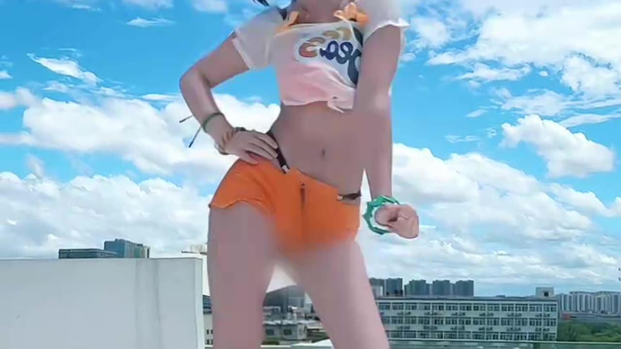 Beach Dance in Orange Shorts