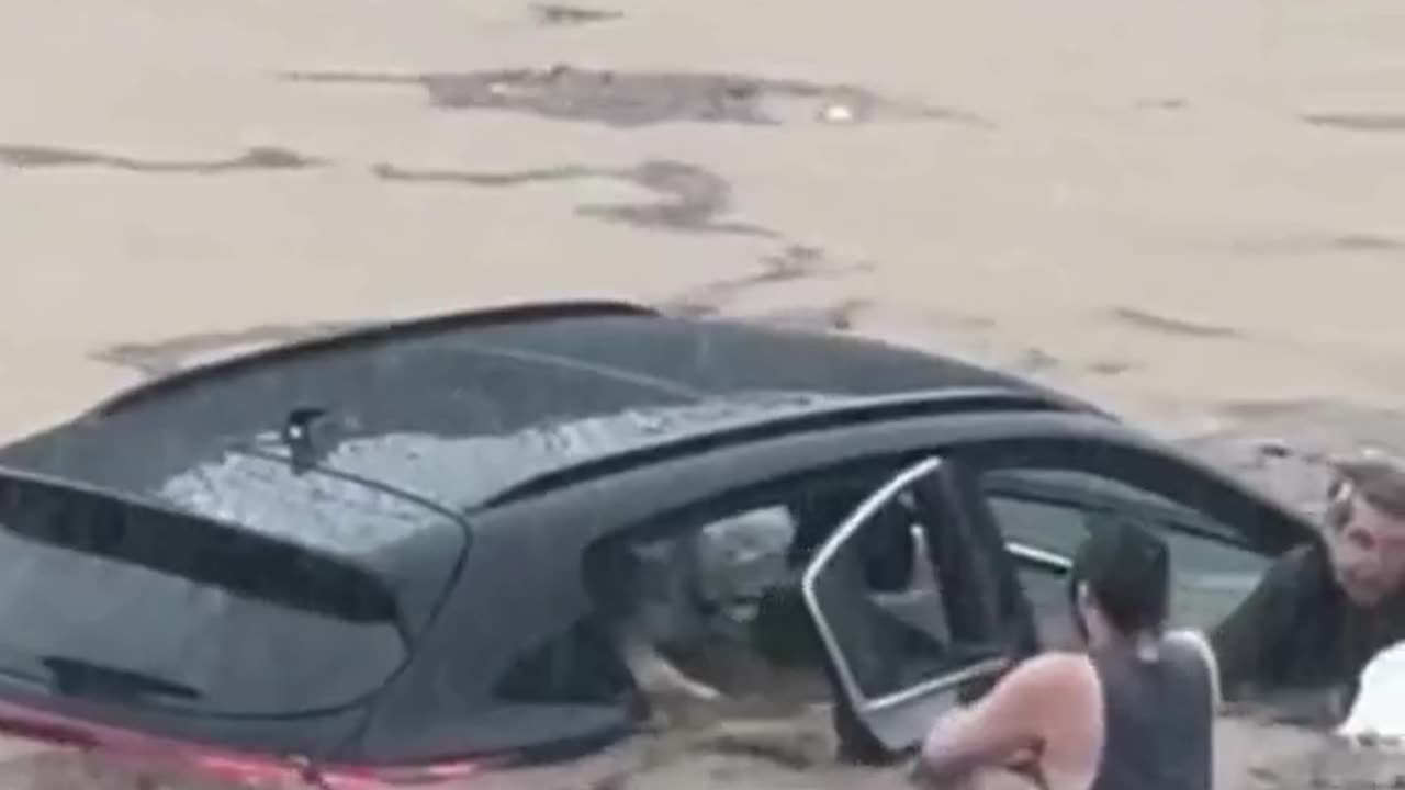 Heroic rescue: man saves amputee and his dog from flash floods 🐾💔 #HeartwarmingMoment