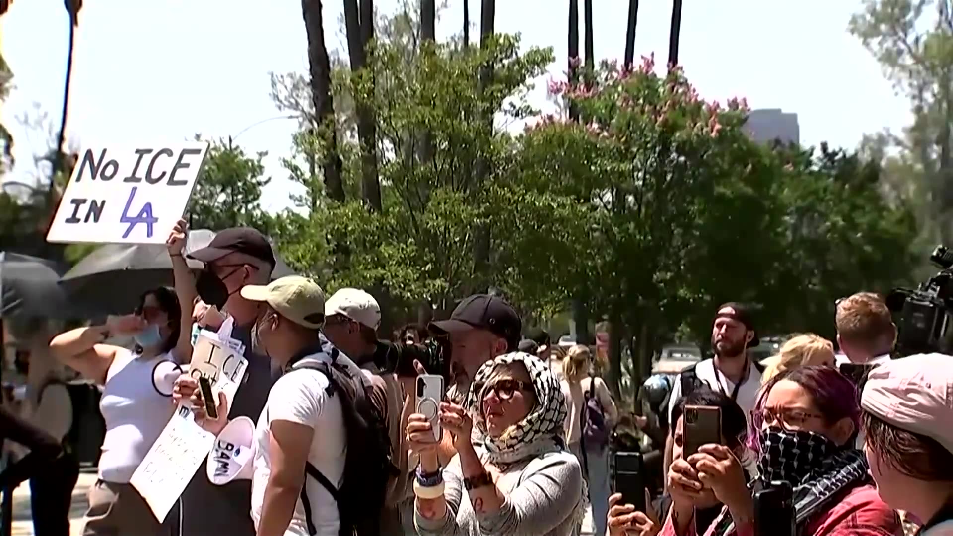 Protesters rally at stadium after Dodgers they denied ICE agents entry