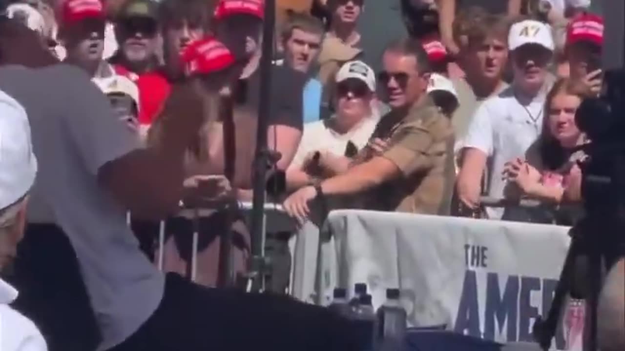 New angle shows Charlie Kirk’s team jumping to save him as shots are fired.