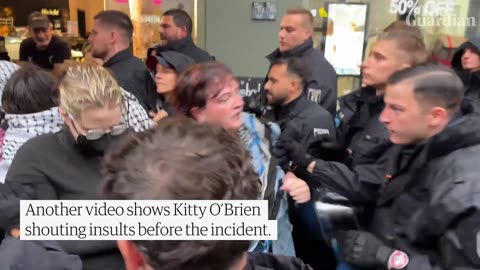 Footage shows police officer punching activist Kitty O'Brien in the face during a protest