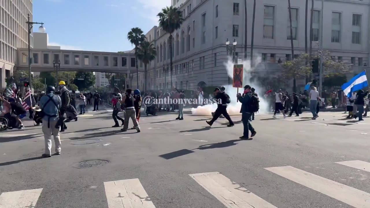 CHAOS is unfolding quickly as more tear gas is launched toward protestors.