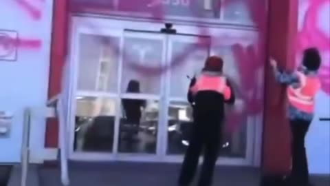 Looney “Climate Activists” Vandalize Tesla Dealership in Montreal Canada