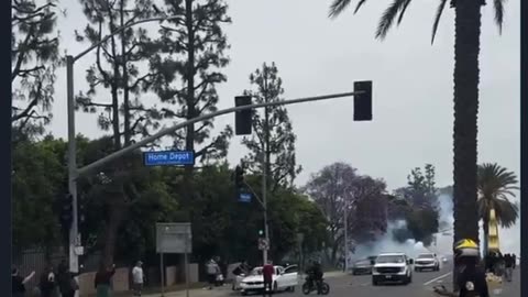 Rioters throw rocks at federal agents at the 'peaceful' but firey protests.