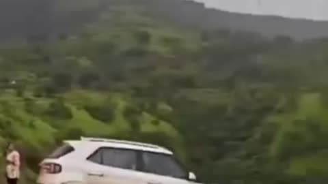 During the stunt, the man lost controls car and the man fell 300 feet down into a ditch along with r