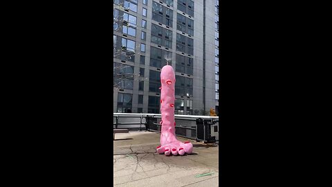 A 10-foot-tall pink "Foot Fountain" that sprays water from its tip is installed in New York.