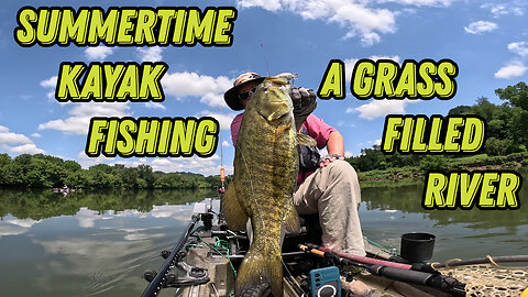 Summertime Kayak Fishing A Grass Filled River