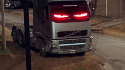 Red-Eyed Truck Watches Neighborhood