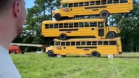 How Many School Buses Can We Stack?