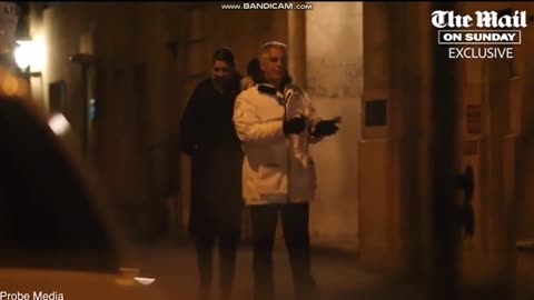 Jeffrey Epstein and woman walk out of mansion after party with prince Andrew and others (2010)