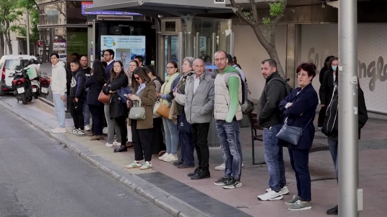 Madrid commuters make their way to work after blackout hit Spain