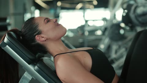 Woman on a Strength Training Machine