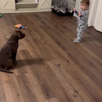 Kiddo training her puppy