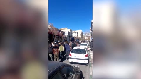 Protesters march in Tehran over high inflation