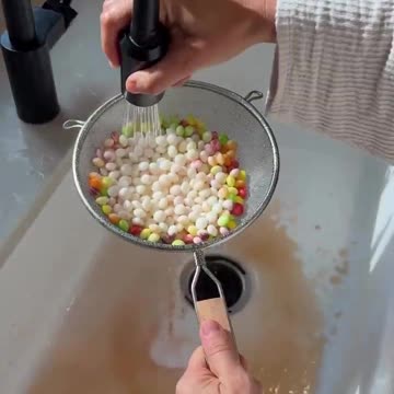 This mom is going viral for making “natural” skittles by removing the artificial dye.