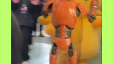 Robot leading Pikachu 🐱🤖️