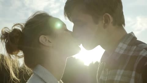 Couple Kissing in the Sunlight, Very Romantic Moment