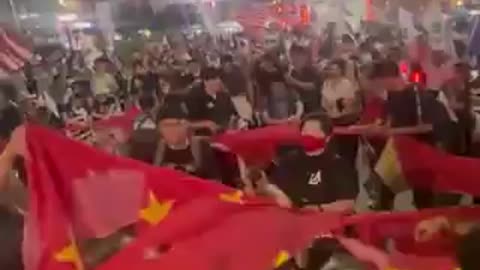 China's Communist Party rips the flag of China stealing Korea with election fraud