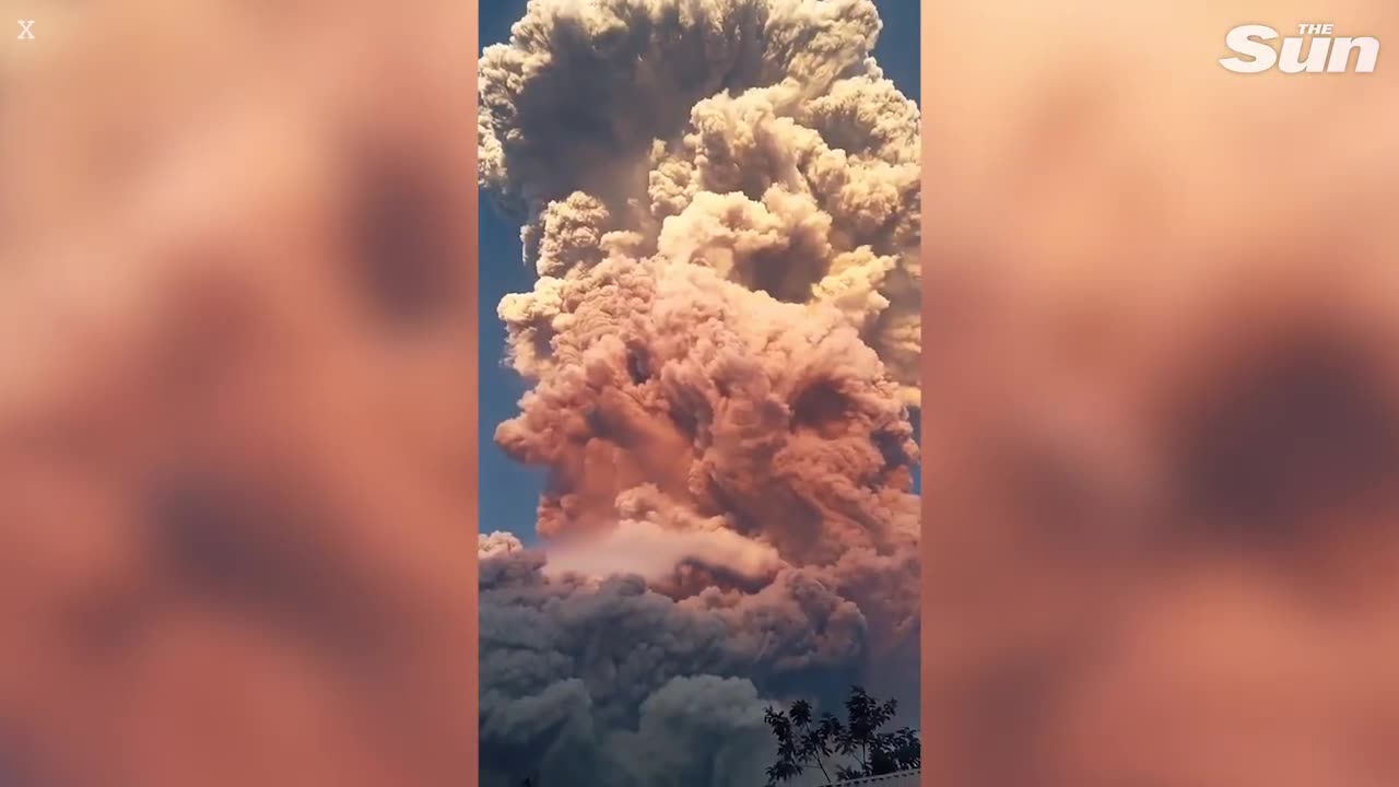 Moment huge Indonesian volcano erupts with 6-MILE high ash cloud triggering flight & tsunami alerts