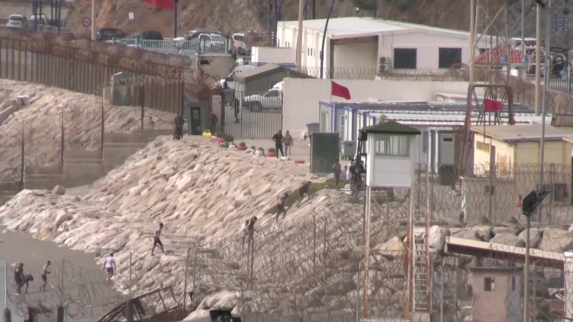 Children among migrants swimming from Morocco to Spanish enclave