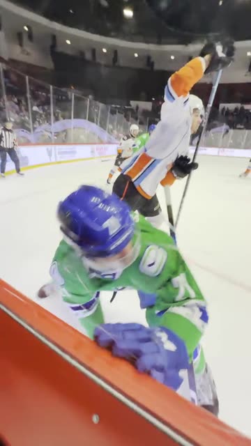 Hockey Slam Viewed From Front Row Seats