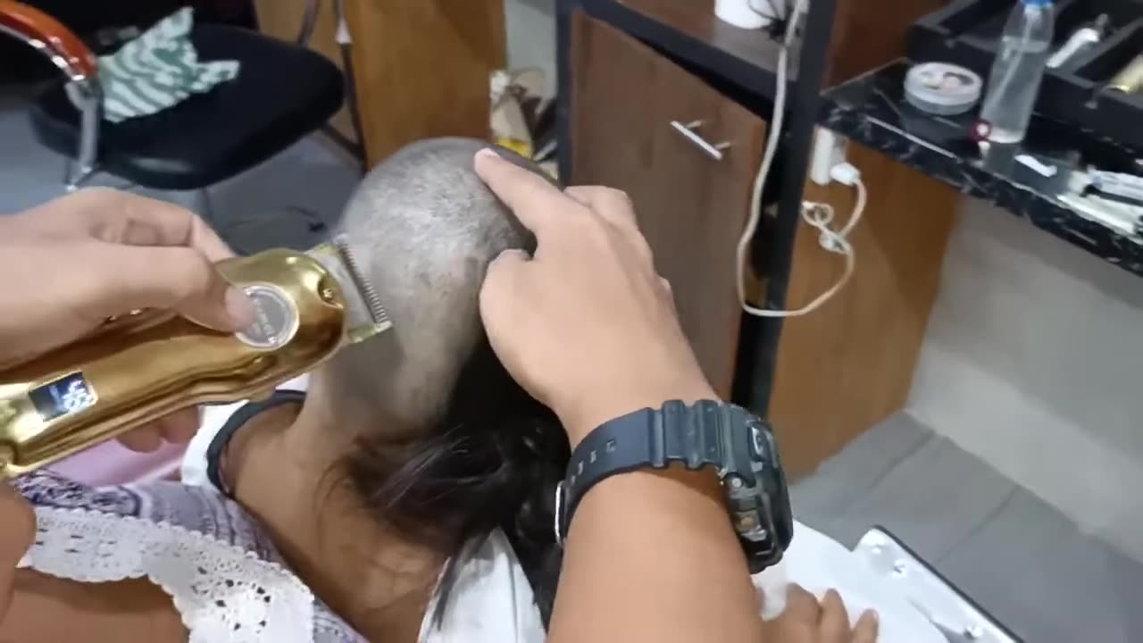 Mother and her daughter buzzcut