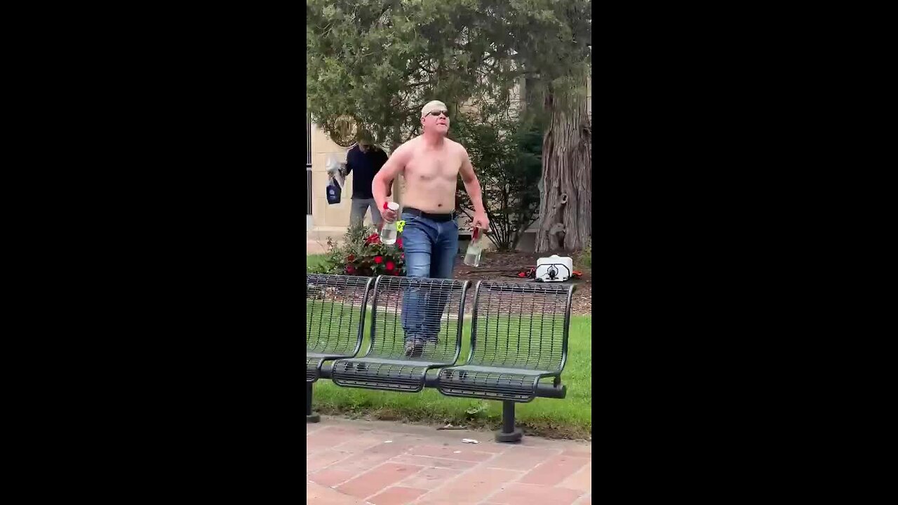 Video of Suspected Boulder Attacker Carrying a Fire Bomb, Threatening Bystanders