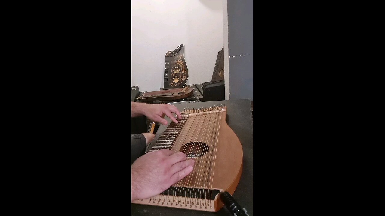 Practicing "This is Halloween" on the Zither