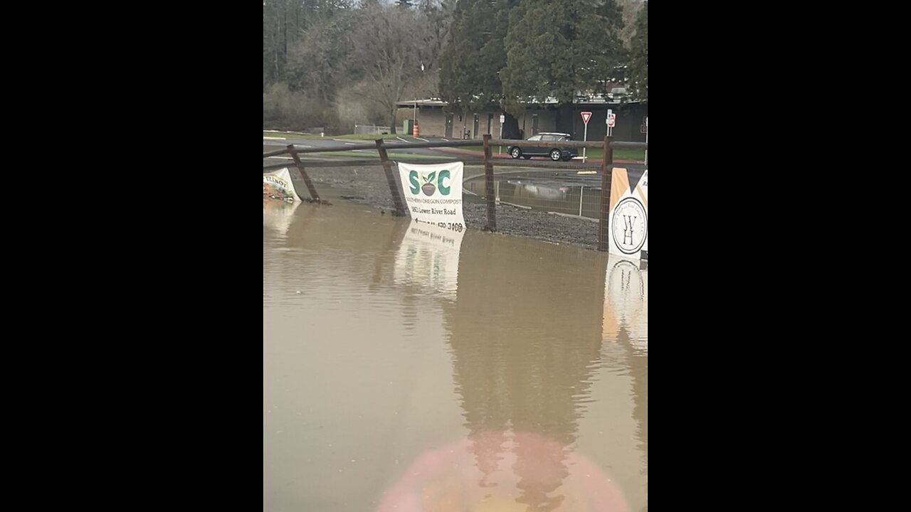 Flood waters close road in front of elementary school