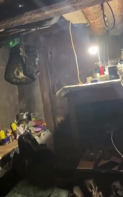 Russian Dugout is Rocked When Shell Lands Close By