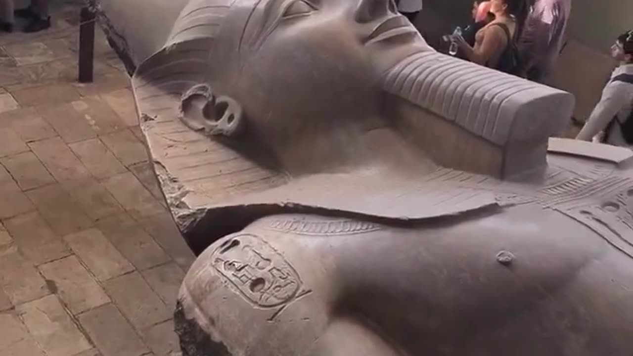 A close-up view of the ancient statue of Ramses II inside the museum in Egypt.