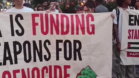"USA IS FUNDING WEAPONS FOR GENOCIDE"