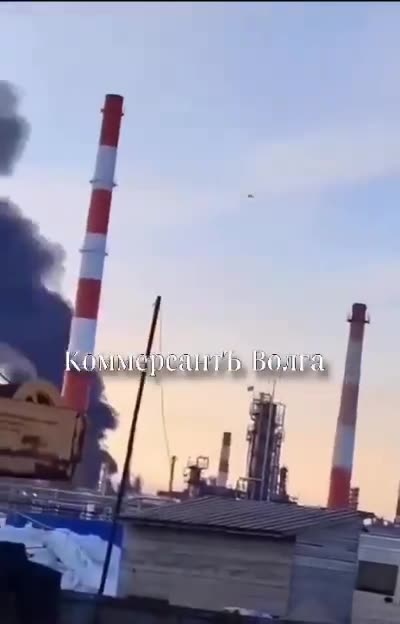 Dramatic Footage of Ukrainian Long-Range Attack Drone Flying Over Burning Refinery